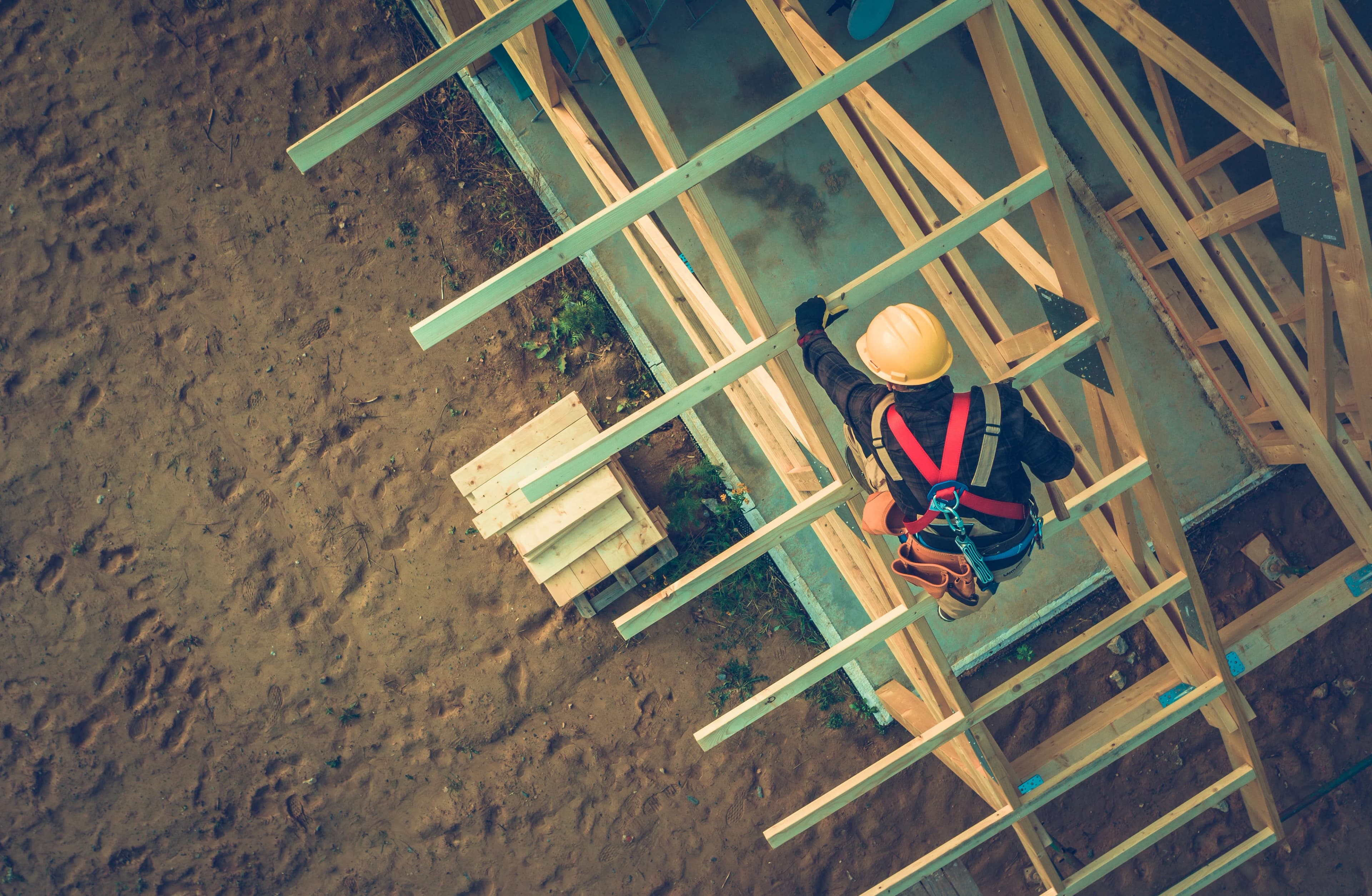 Man in harness on roof